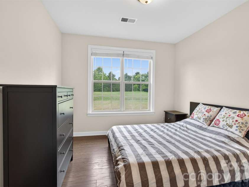 8224 Cornhill Avenue, Charlotte, NC 28277.  MLS# CAR4386432, YatesRealty ID 28189. Guest Room downstairs