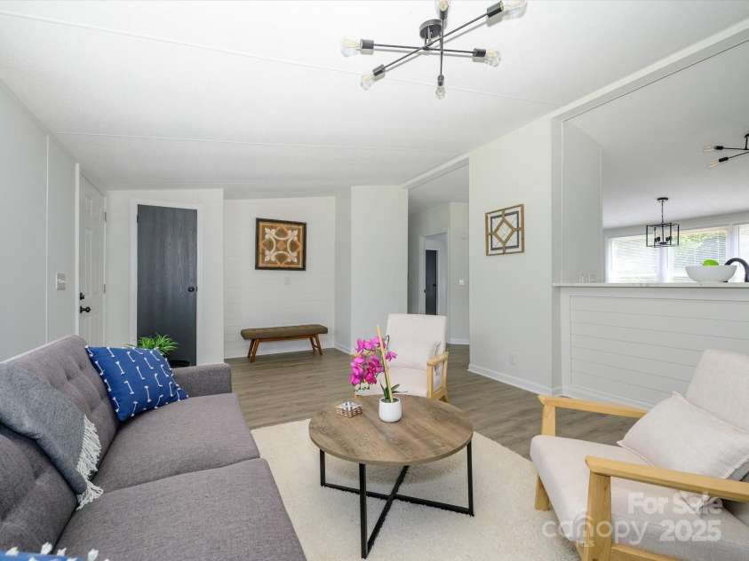 4833 Verde View Drive, Gastonia, NC 28056.  MLS# CAR4276387, YatesRealty ID 28190. View from family room with back to iron ore board and batten wall.