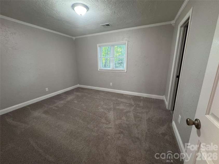 21123 Rio Oro Drive, Cornelius, NC 28031.  MLS# CAR4387095, YatesRealty ID 28192. Guest Bedroom