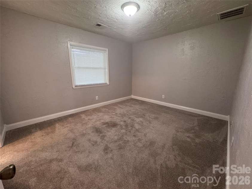 21123 Rio Oro Drive, Cornelius, NC 28031.  MLS# CAR4387095, YatesRealty ID 28192. Guest Bedroom