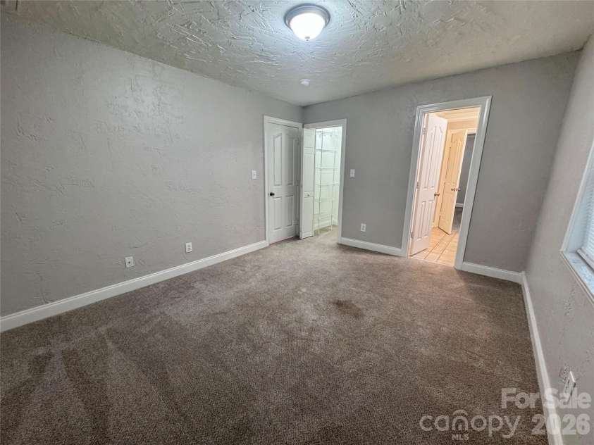 21123 Rio Oro Drive, Cornelius, NC 28031.  MLS# CAR4387095, YatesRealty ID 28192. Guest Bedroom
