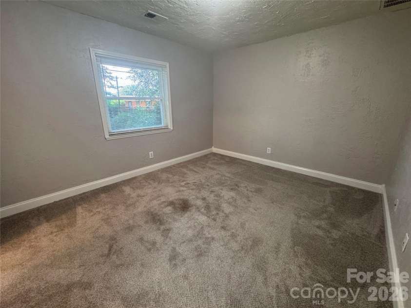 21123 Rio Oro Drive, Cornelius, NC 28031.  MLS# CAR4387095, YatesRealty ID 28192. Guest Bedroom