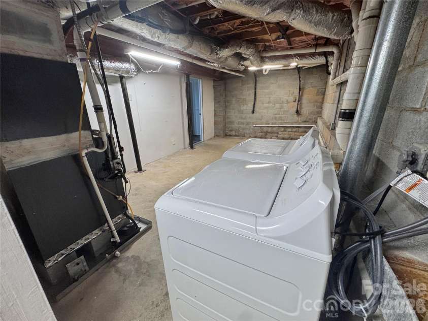 21123 Rio Oro Drive, Cornelius, NC 28031.  MLS# CAR4387095, YatesRealty ID 28192. Laundry in Basement
