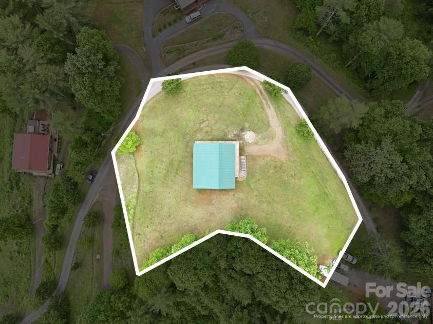 168 Barefoot Cove, Burnsville, NC 28714.  MLS# CAR4387898, YatesRealty ID 28194. An acre to enjoy!
