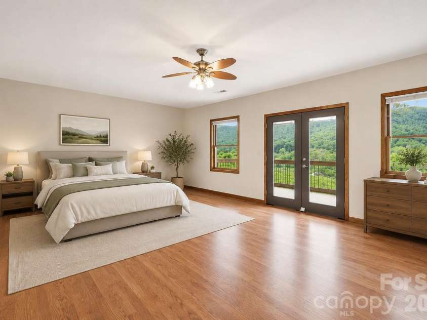 168 Barefoot Cove, Burnsville, NC 28714.  MLS# CAR4387898, YatesRealty ID 28194. Downstairs space virtually staged as a bedroom