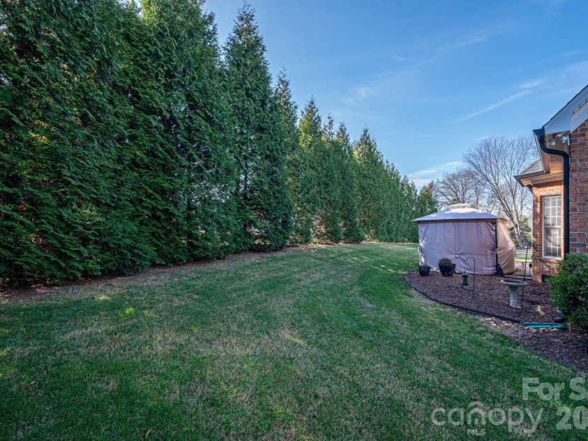 4009 Tall Timber Court, Gastonia, NC 28056.  MLS# CAR4336978, YatesRealty ID 2820. Backyard