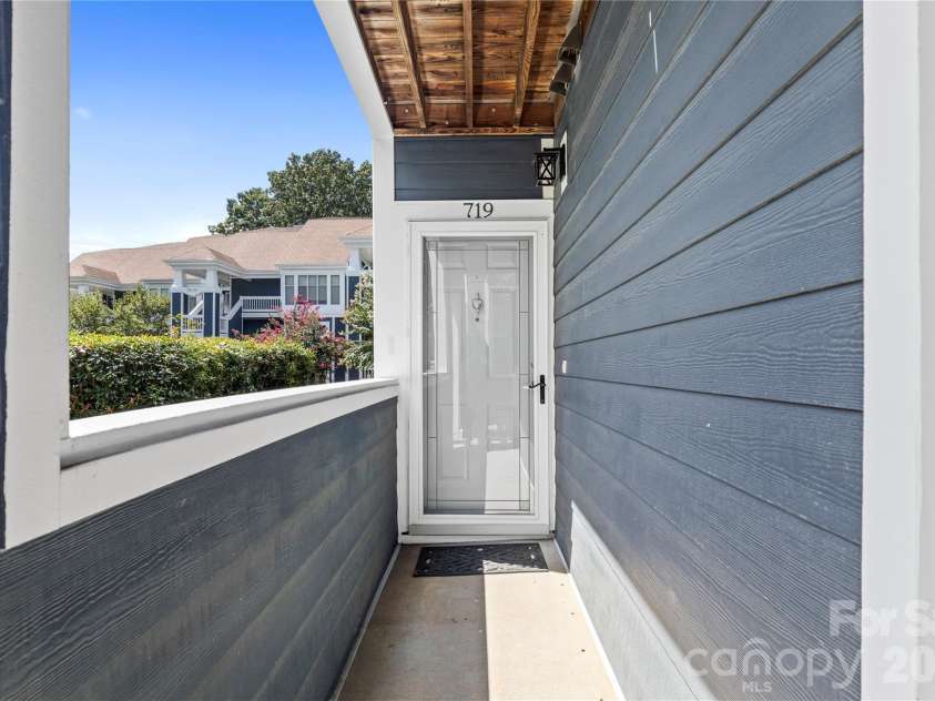 719 Southwest Drive, Davidson, NC 28036.  MLS# CAR4373406, YatesRealty ID 28209. Front door