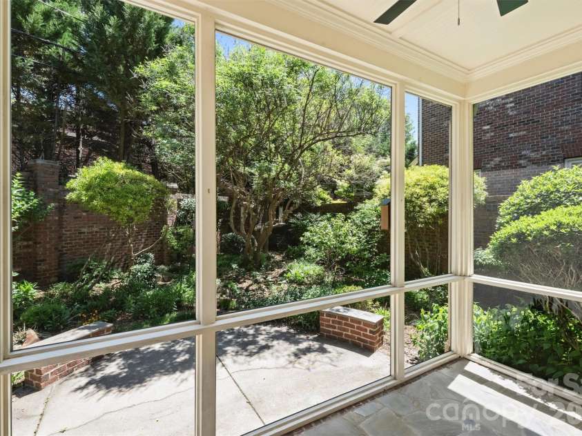1115 Kings Drive, Charlotte, NC 28207.  MLS# CAR4367610, YatesRealty ID 28210. Screen porch