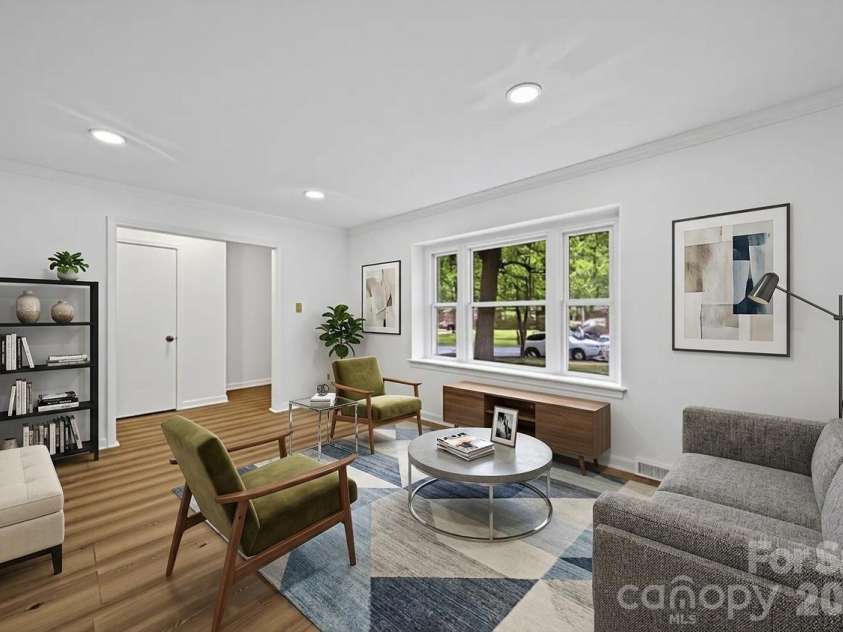 6126 Eagle Peak Drive, Charlotte, NC 28214.  MLS# CAR4376554, YatesRealty ID 28212. Virtual Staging (Living Room)