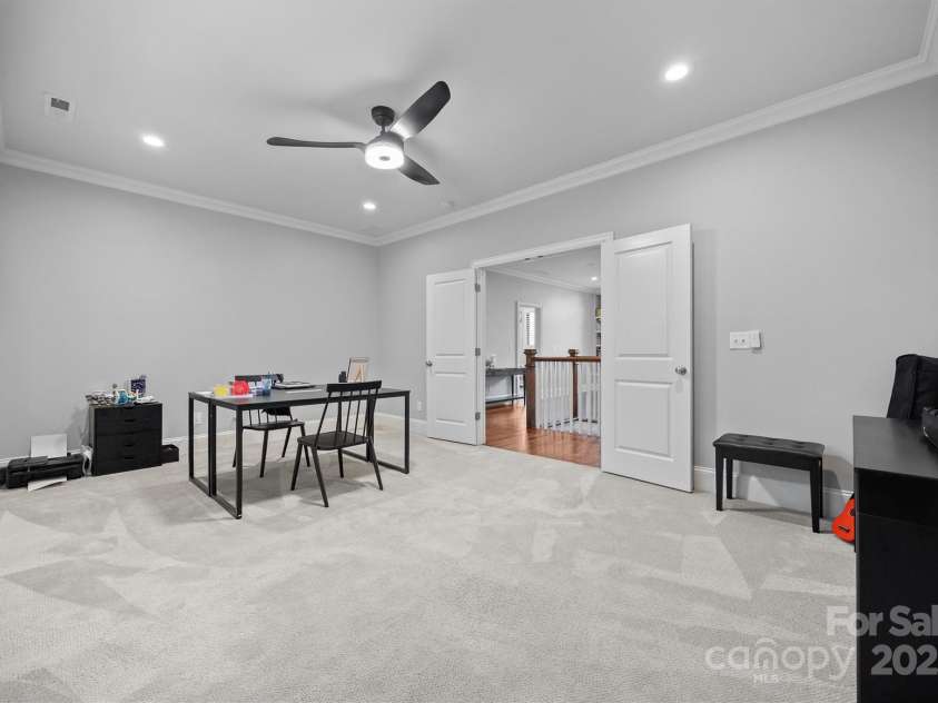 1223 Home Place, Matthews, NC 28105.  MLS# CAR4265332, YatesRealty ID 28217. Huge Upstairs Bonus Room with French Doors