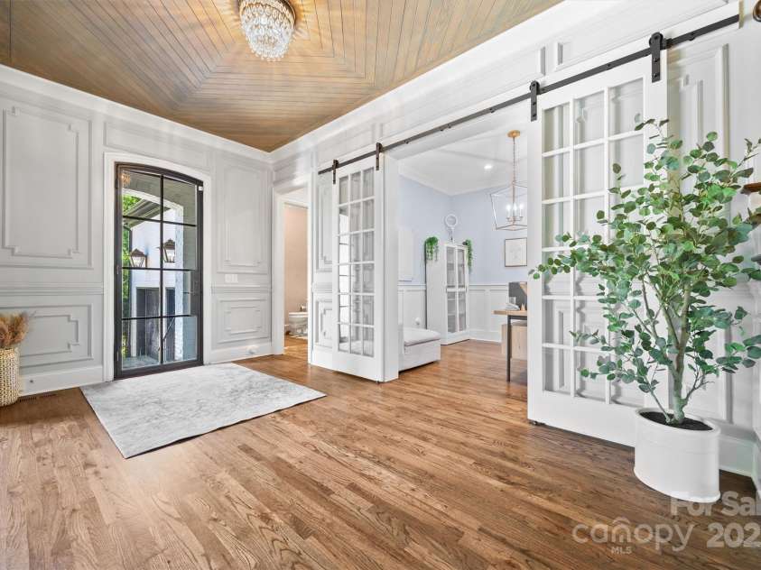 1223 Home Place, Matthews, NC 28105.  MLS# CAR4265332, YatesRealty ID 28217. Natural Light pours into the airy entryway, featuring high ceilings, custom accents & a stunning decorative ceiling.