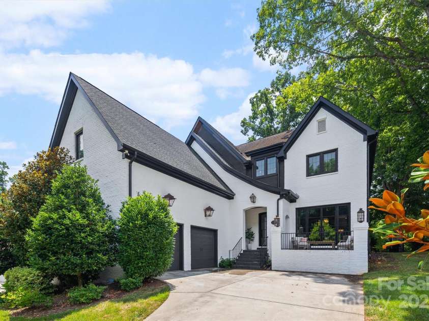 1223 Home Place, Matthews, NC 28105.  MLS# CAR4265332, YatesRealty ID 28217. Situated on a large 0.54 acre lot with mature trees, excellent curb appeal, and No HOA.