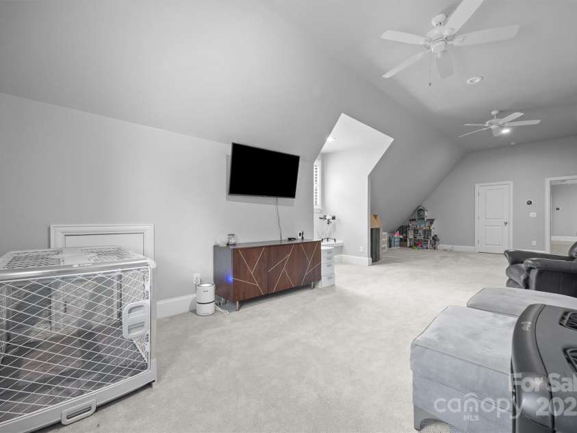 1223 Home Place, Matthews, NC 28105.  MLS# CAR4265332, YatesRealty ID 28217. Upstairs Bedroom 5 also makes an amazing loft, bonus room, or hobby space.