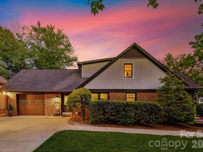 409 Whitestone Road, Charlotte, NC 28270.  MLS# CAR4383558, YatesRealty ID 28218. Parking area by detached Garage