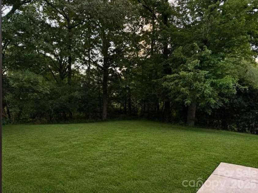 409 Whitestone Road, Charlotte, NC 28270.  MLS# CAR4383558, YatesRealty ID 28218. Present Backyard