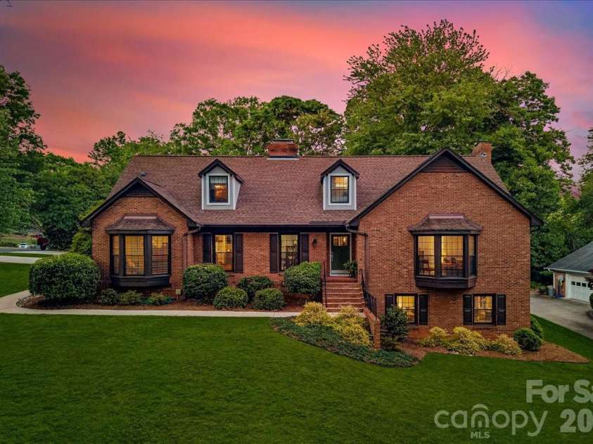 409 Whitestone Road, Charlotte, NC 28270.  MLS# CAR4383558, YatesRealty ID 28218. Twilight at Whitestone