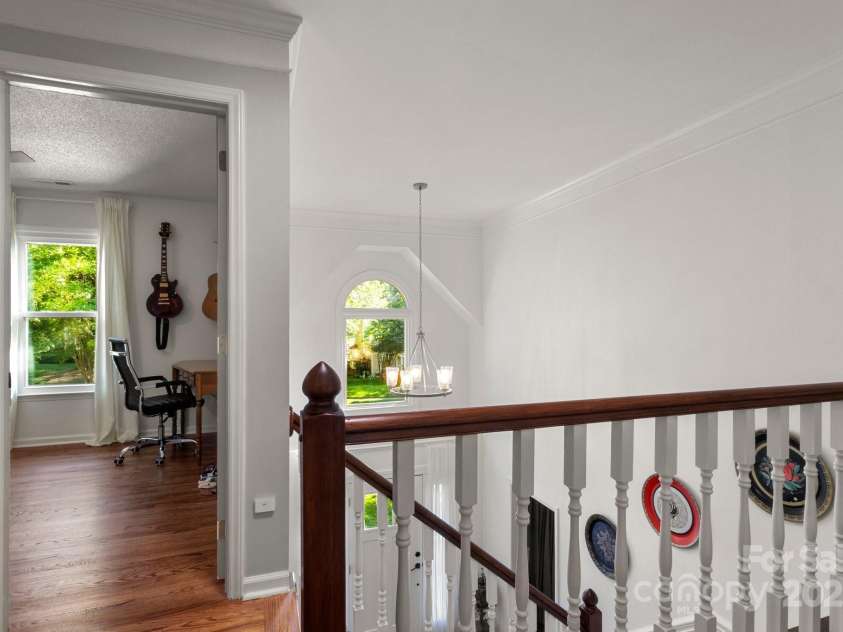12602 Angel Oak Drive, Huntersville, NC 28078.  MLS# CAR4259942, YatesRealty ID 28225. 2nd bedroom right near the stairs and primary bedroom for easy access
