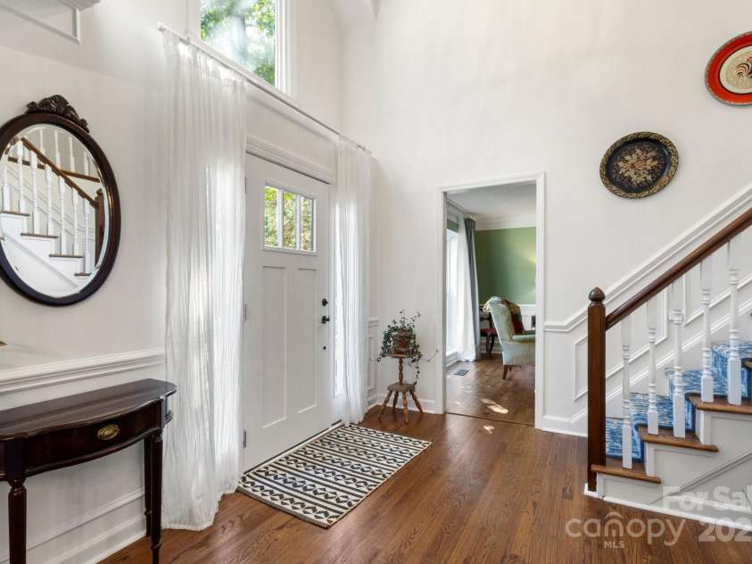 12602 Angel Oak Drive, Huntersville, NC 28078.  MLS# CAR4259942, YatesRealty ID 28225. New entry door and sidelights and all new stair treads, railing and flooring..
