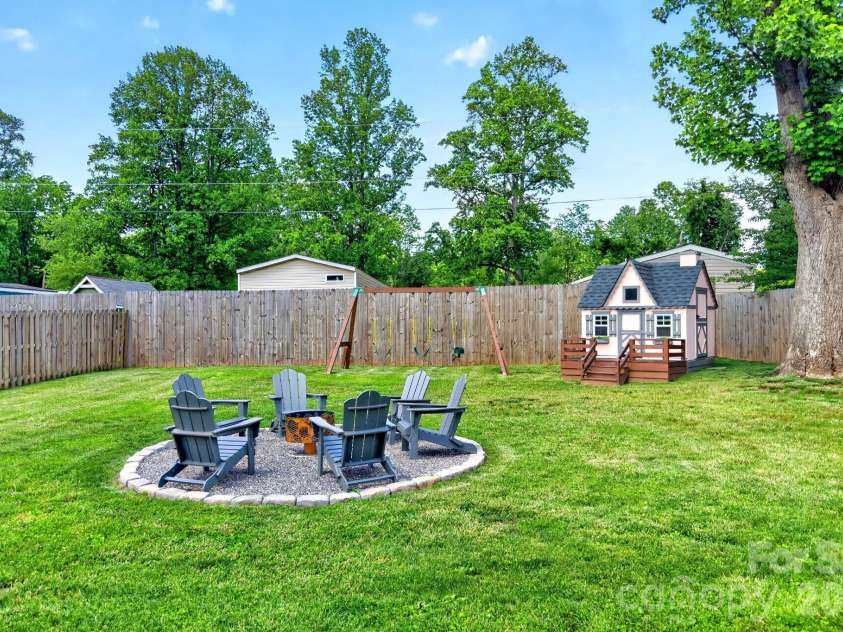 219 Flat Creek Road, Black Mountain, NC 28711.  MLS# CAR4388002, YatesRealty ID 28226. Firepit