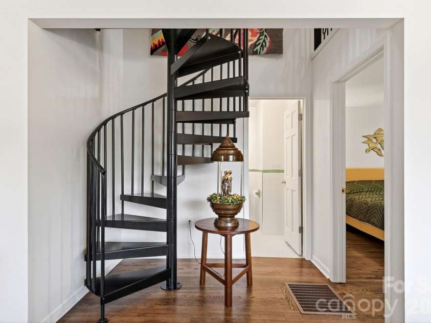 219 Flat Creek Road, Black Mountain, NC 28711.  MLS# CAR4388002, YatesRealty ID 28226. Spiral Staircase