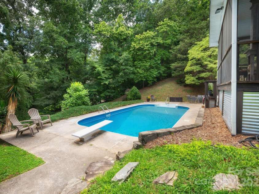 98 Mashburn Branch Road, Old Fort, NC 28762.  MLS# CAR4266767, YatesRealty ID 28229. Beautiful and private back yard with in-ground swimming pool