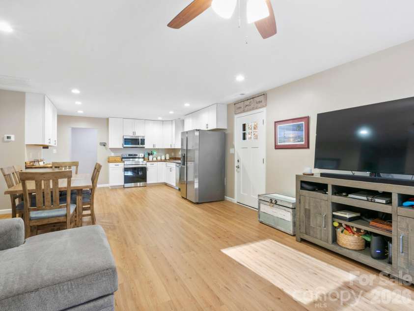 30 Shire Way Lane, Leicester, NC 28748.  MLS# CAR4319147, YatesRealty ID 2823. Living Room + Kitchen + Dining Area