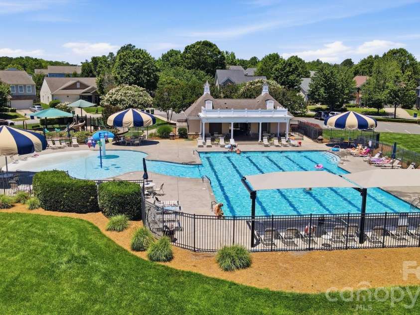 1231 Tranquil Falls Lane, Matthews, NC 28104.  MLS# CAR4390009, YatesRealty ID 28232. Community Pool