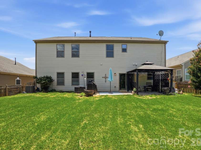 1231 Tranquil Falls Lane, Matthews, NC 28104.  MLS# CAR4390009, YatesRealty ID 28232. Fenced in Backyard