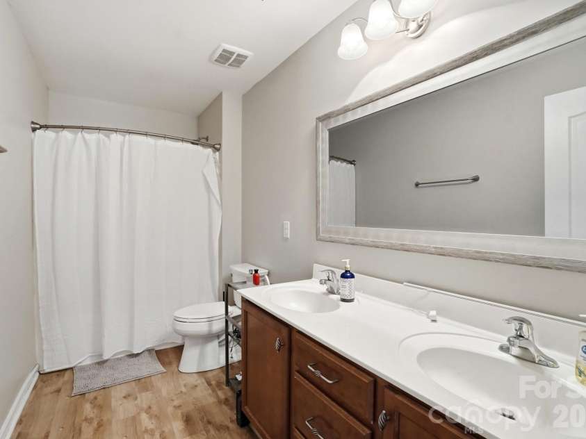 1231 Tranquil Falls Lane, Matthews, NC 28104.  MLS# CAR4390009, YatesRealty ID 28232. Full Bath #2 on Upper Level