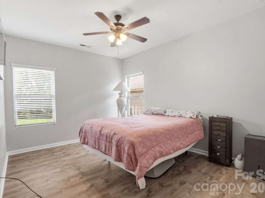 1231 Tranquil Falls Lane, Matthews, NC 28104.  MLS# CAR4390009, YatesRealty ID 28232. Guest BR on Main