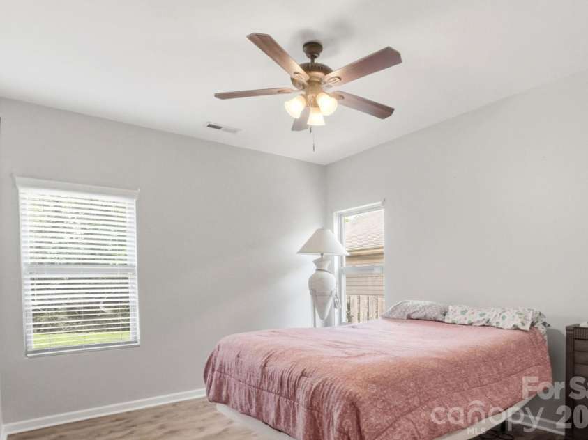 1231 Tranquil Falls Lane, Matthews, NC 28104.  MLS# CAR4390009, YatesRealty ID 28232. Secondary BR#1 On the Main Level