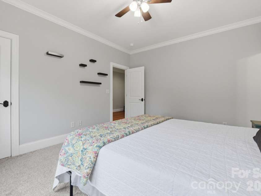 184 Ashmore Circle, Troutman, NC 28166.  MLS# CAR4384807, YatesRealty ID 28237. Bright and inviting bedroom offering privacy and comfortable living space.