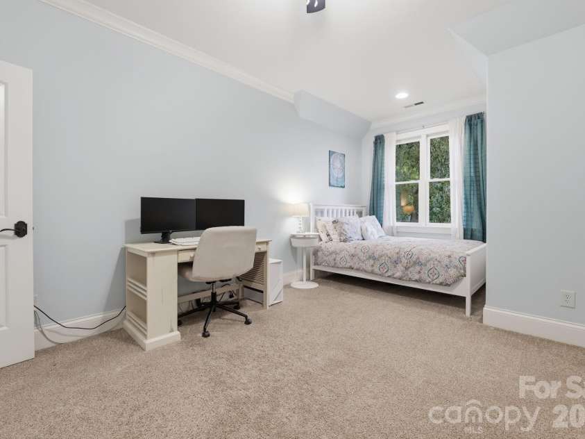 184 Ashmore Circle, Troutman, NC 28166.  MLS# CAR4384807, YatesRealty ID 28237. Generously sized bedroom with flexible space for sleeping, studying, or working from home.