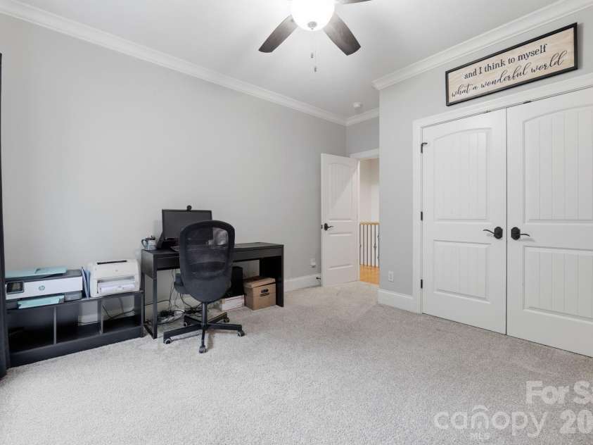 184 Ashmore Circle, Troutman, NC 28166.  MLS# CAR4384807, YatesRealty ID 28237. Spacious flex room with ample storage and abundant natural light.
