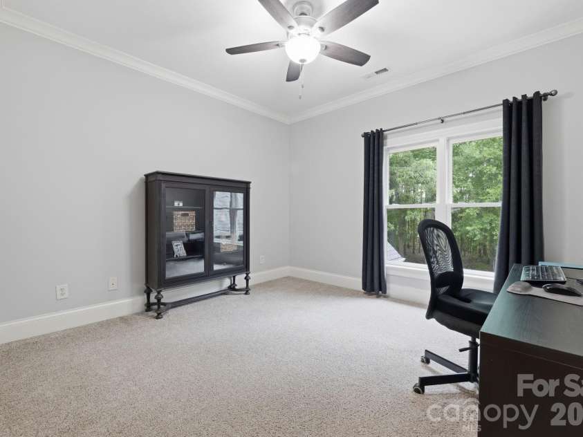 184 Ashmore Circle, Troutman, NC 28166.  MLS# CAR4384807, YatesRealty ID 28237. Versatile upper-level room ideal for a home office, study, or guest bedroom.