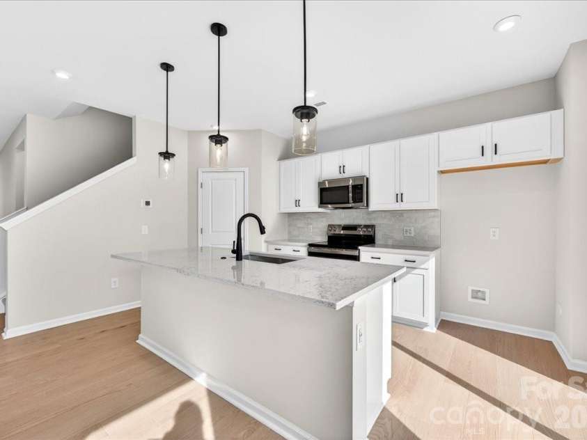 6053 Longar Lane, Charlotte, NC 28269.  MLS# CAR4368932, YatesRealty ID 28239. Chef inspired kitchen with Welcoming II Design Package 