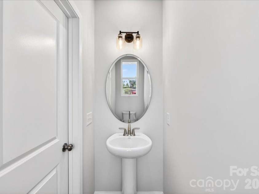6053 Longar Lane, Charlotte, NC 28269.  MLS# CAR4368932, YatesRealty ID 28239. First floor powder 