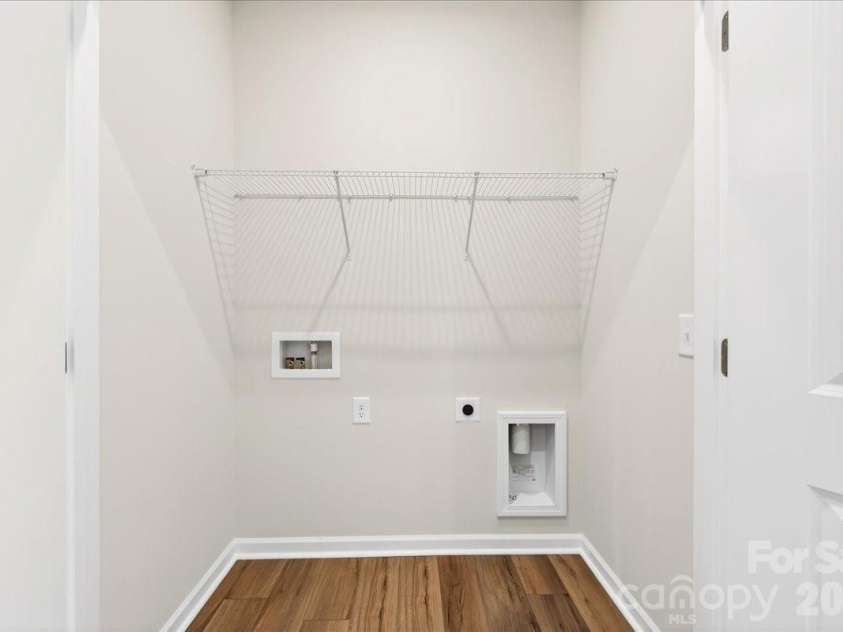 6053 Longar Lane, Charlotte, NC 28269.  MLS# CAR4368932, YatesRealty ID 28239. Laundry closet 