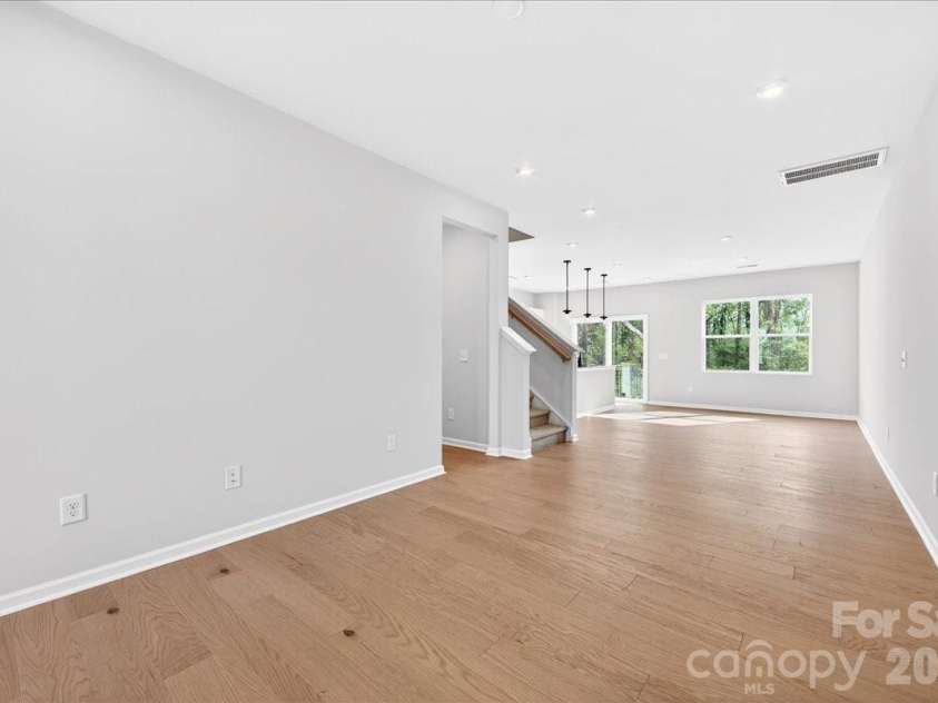 6053 Longar Lane, Charlotte, NC 28269.  MLS# CAR4368932, YatesRealty ID 28239. Light filled first floor