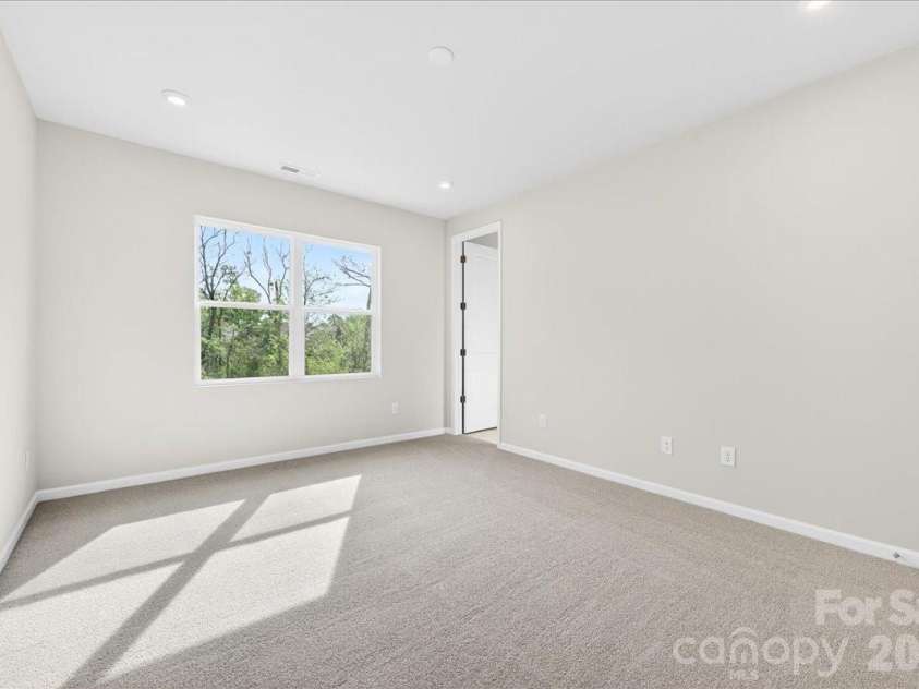 6053 Longar Lane, Charlotte, NC 28269.  MLS# CAR4368932, YatesRealty ID 28239. Primary Bedroom