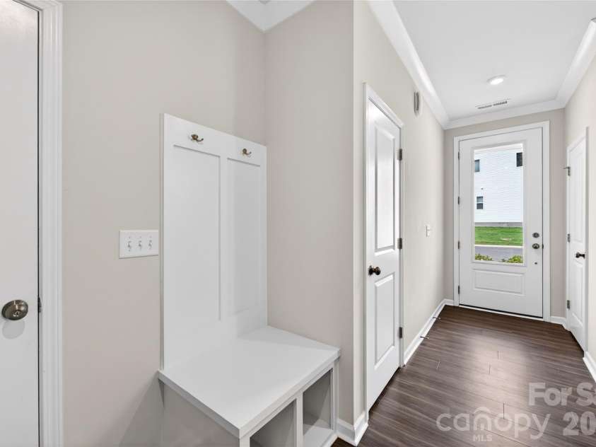 6021 Longar Lane, Charlotte, NC 28269.  MLS# CAR4376915, YatesRealty ID 28240. Drop zone located near the garage entry