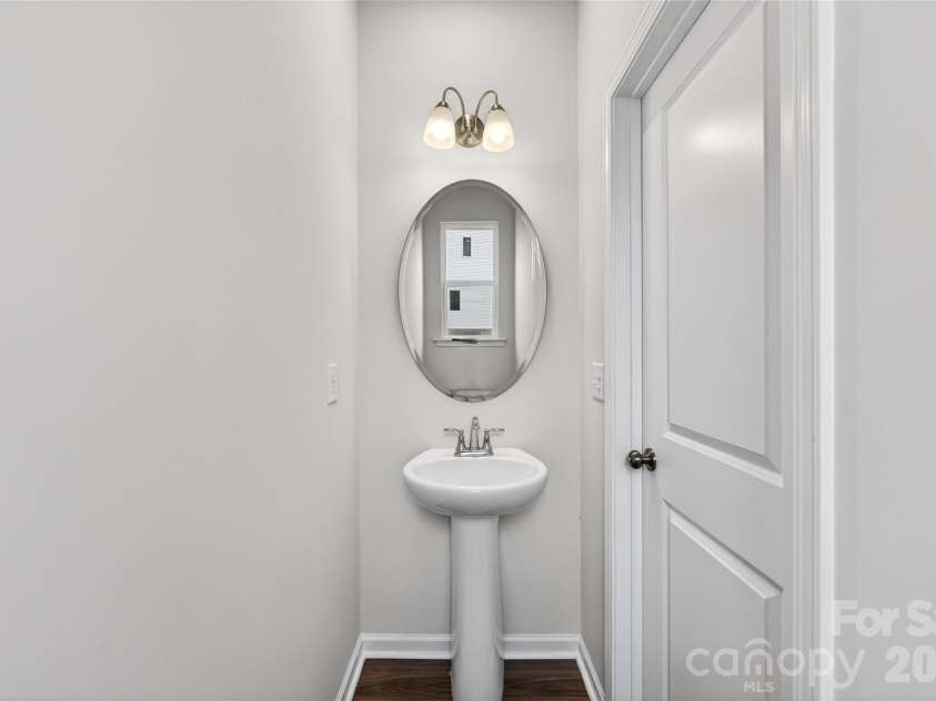 6021 Longar Lane, Charlotte, NC 28269.  MLS# CAR4376915, YatesRealty ID 28240. First floor powder room