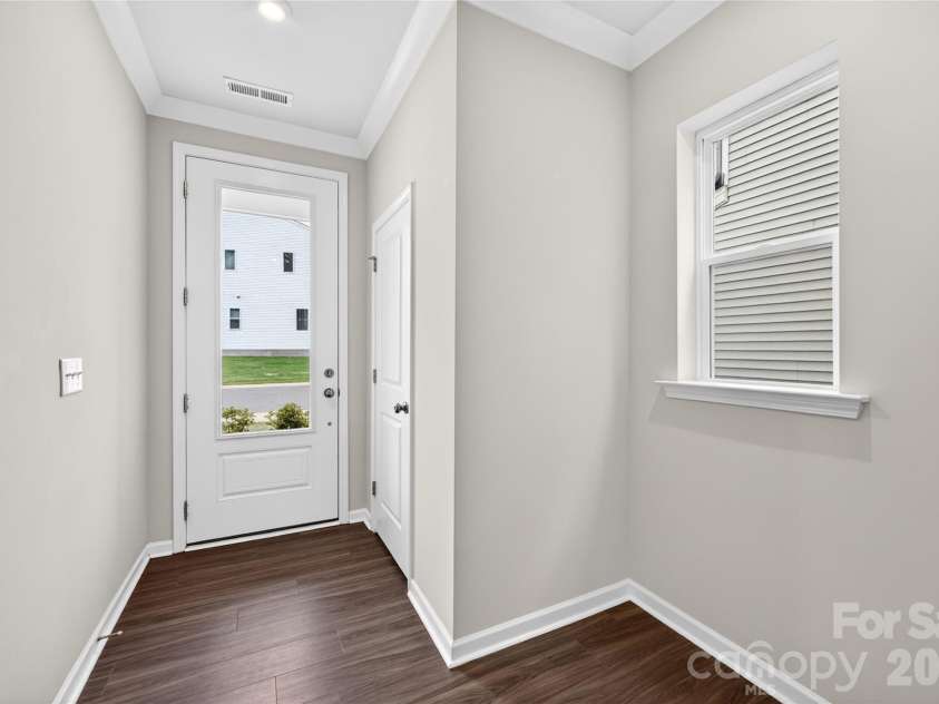 6021 Longar Lane, Charlotte, NC 28269.  MLS# CAR4376915, YatesRealty ID 28240. Foyer