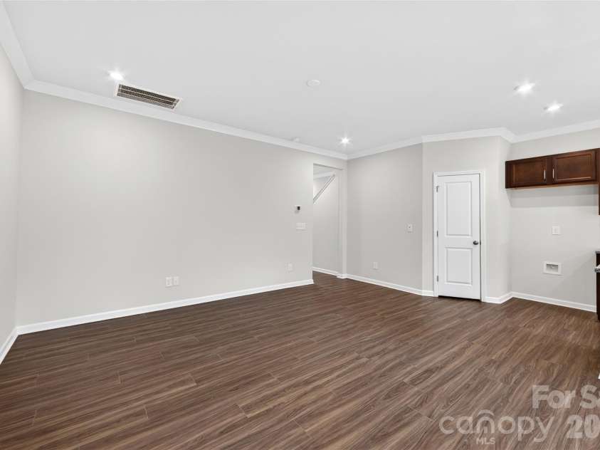 6021 Longar Lane, Charlotte, NC 28269.  MLS# CAR4376915, YatesRealty ID 28240. Open concept living