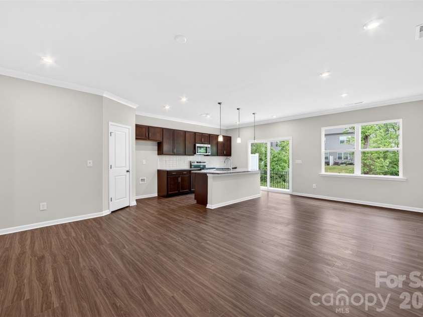 6021 Longar Lane, Charlotte, NC 28269.  MLS# CAR4376915, YatesRealty ID 28240. Open concept living
