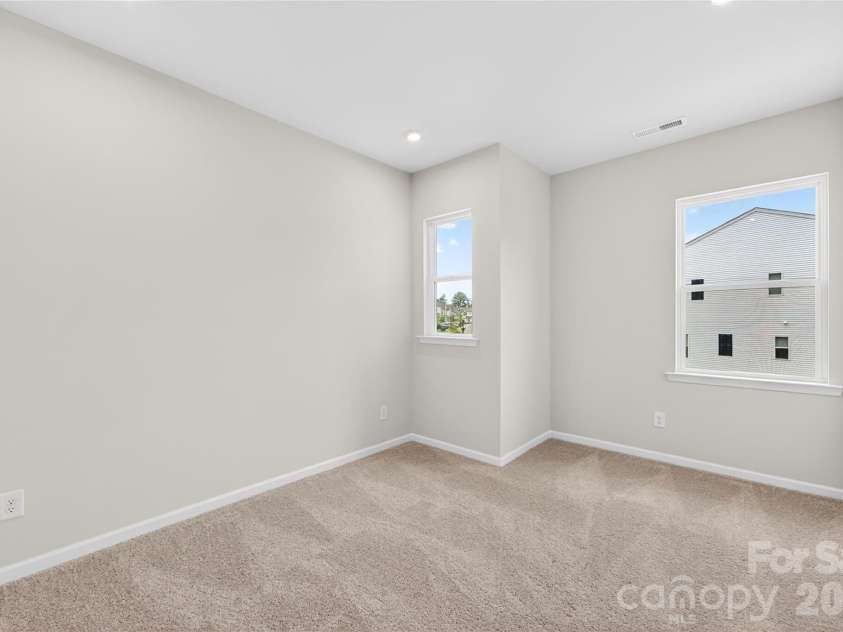 6021 Longar Lane, Charlotte, NC 28269.  MLS# CAR4376915, YatesRealty ID 28240. Secondary bedroom