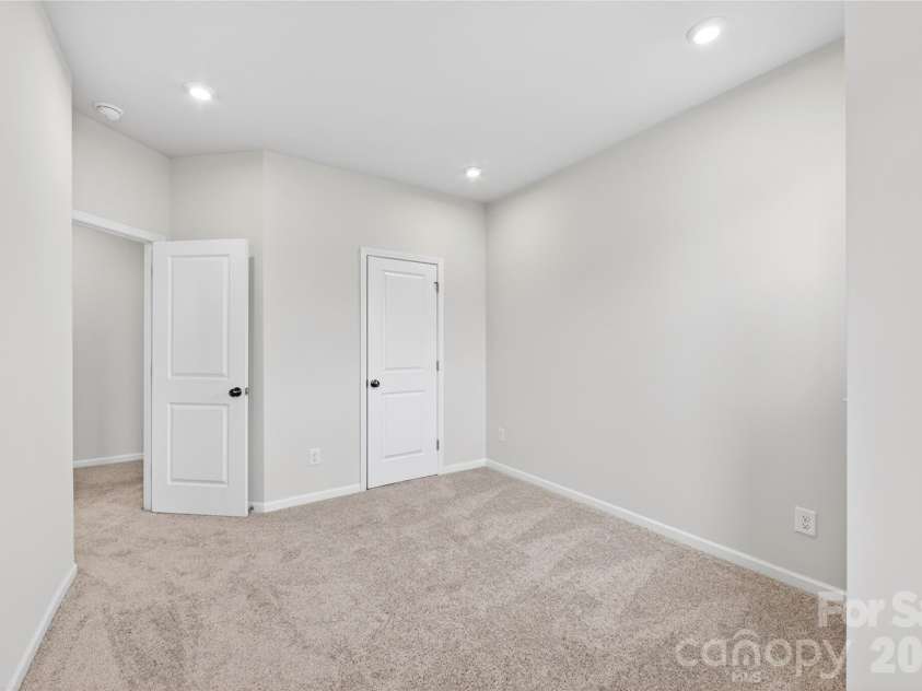 6021 Longar Lane, Charlotte, NC 28269.  MLS# CAR4376915, YatesRealty ID 28240. Secondary bedroom