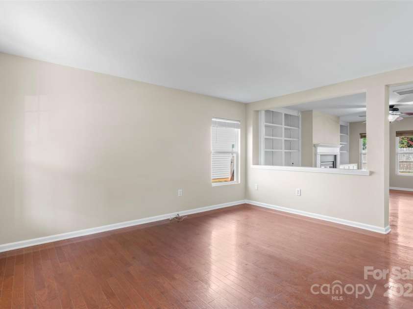 305 Lameshur Lane, Monroe, NC 28110.  MLS# CAR4284788, YatesRealty ID 28245. Living room flooded with natural light