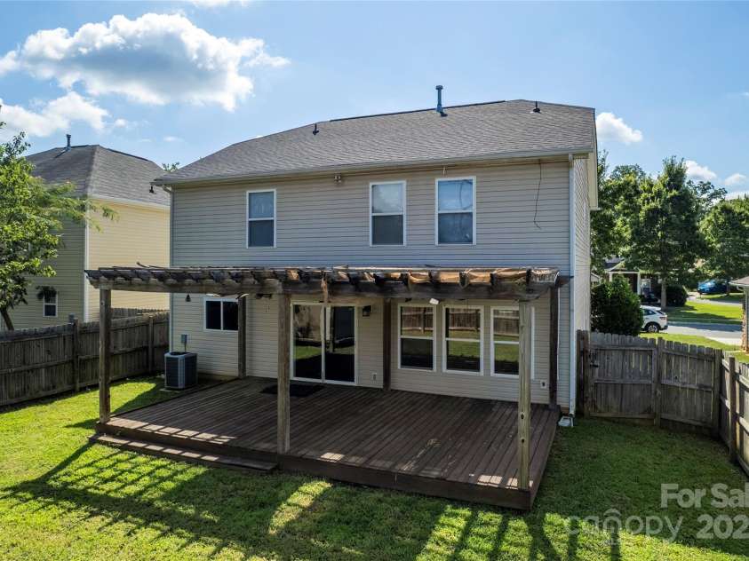 305 Lameshur Lane, Monroe, NC 28110.  MLS# CAR4284788, YatesRealty ID 28245. Perfect backyard for both relaxing and entertaining!