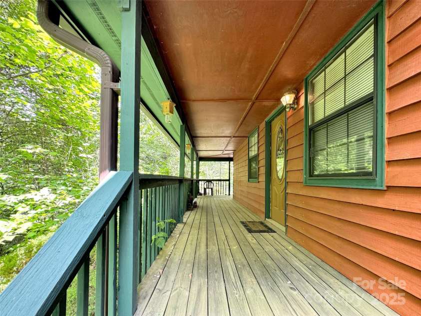 57 Copperhead Cove, Sylva, NC 28779.  MLS# CAR4273722, YatesRealty ID 28247. 